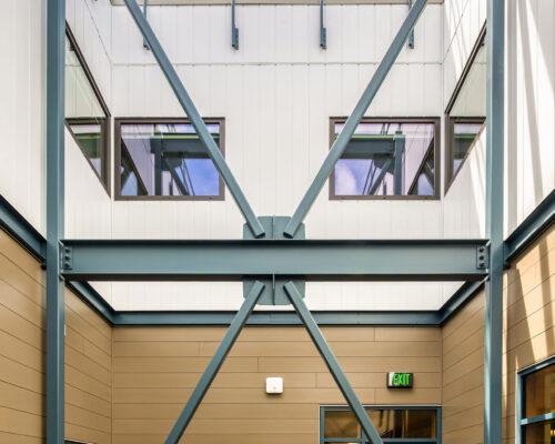Steel structural framing in exterior courtyard space at SOESD Phoenix campus