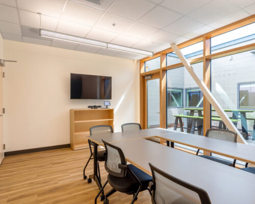 Small conference room with natural light and courtyard views at SOESD Phoenix campus