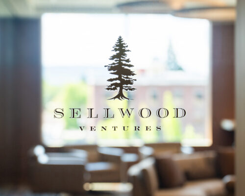 Sellwood Ventures logo on a glass office door